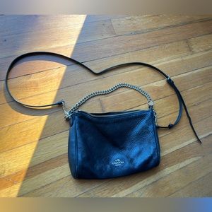 Black pebbled leather Coach crossbody bag with gold chain